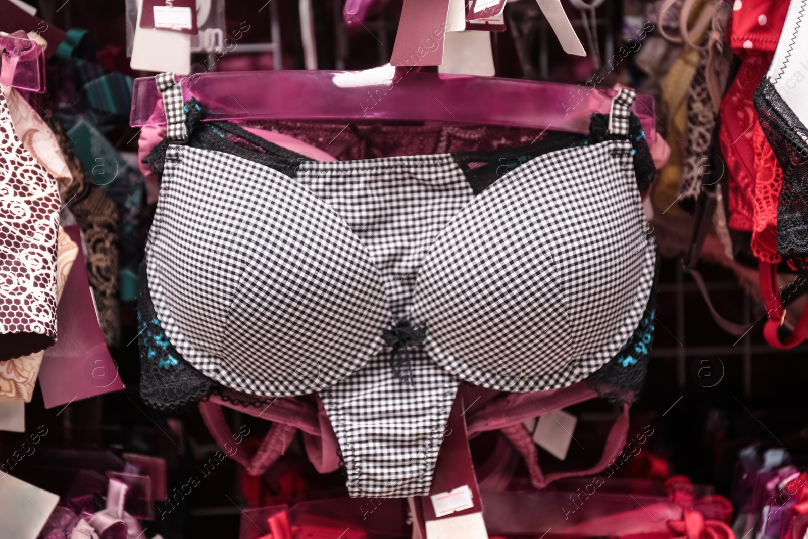 Photo of Checkered set of bra and panties in underwear shop