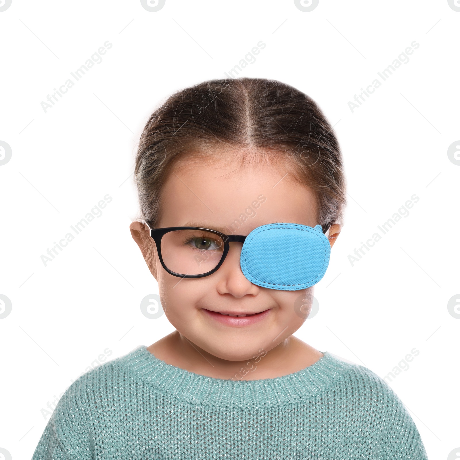 Photo of Happy girl with nozzle on glasses for treatment of strabismus against white background