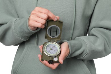 Photo of Woman holding compass on white background, closeup