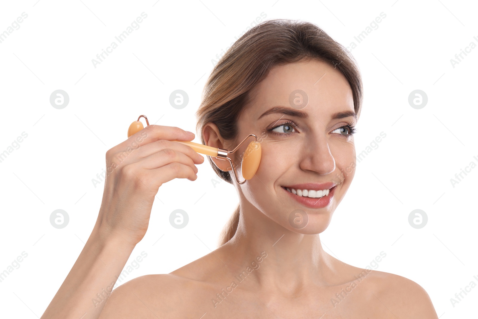 Photo of Young woman using natural jade face roller on white background