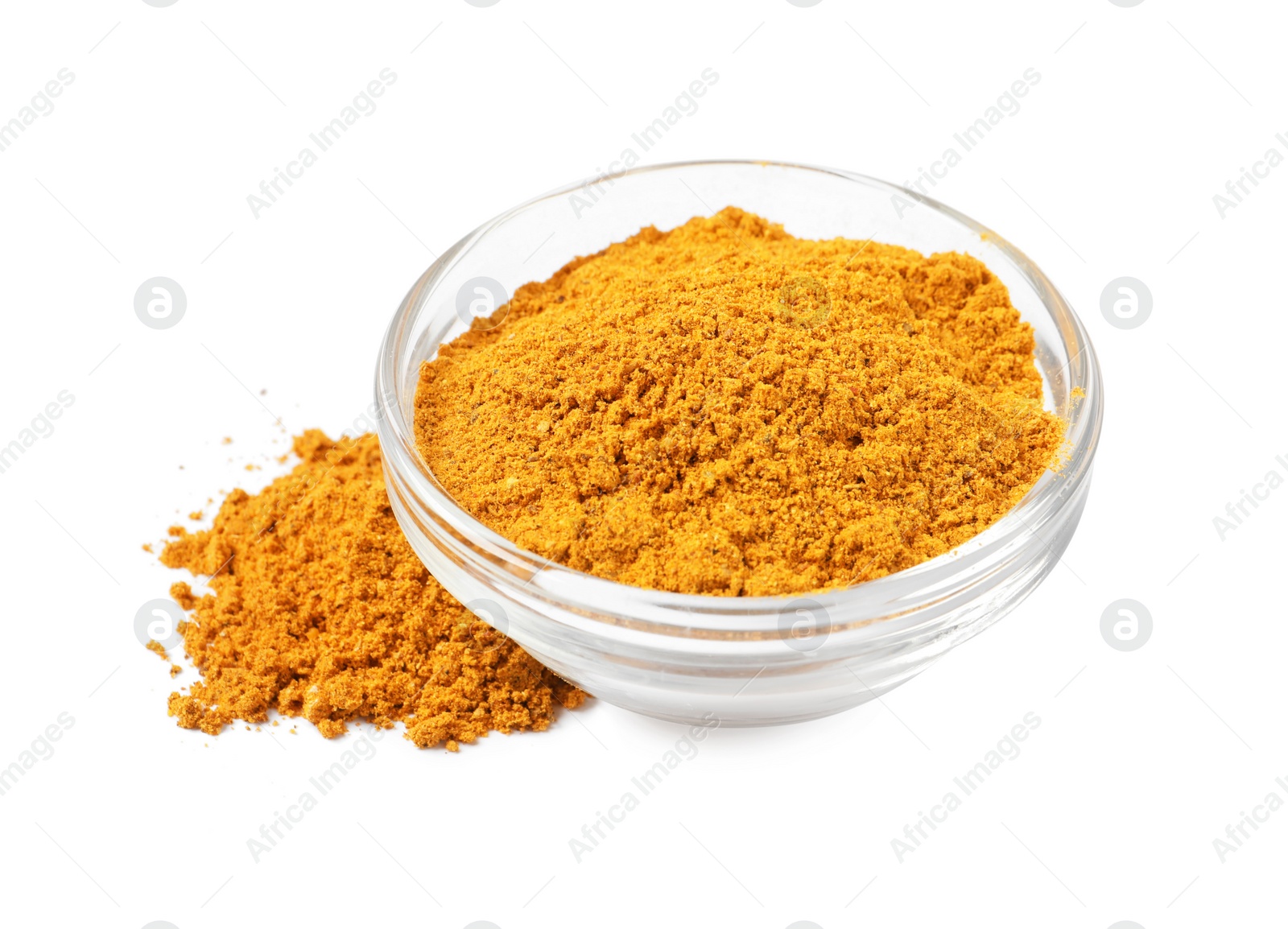 Photo of Curry powder in bowl isolated on white