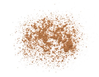 Dry aromatic cinnamon powder isolated on white, top view