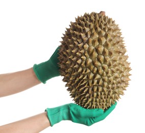 Woman in gloves holding fresh ripe durian on white background, closeup