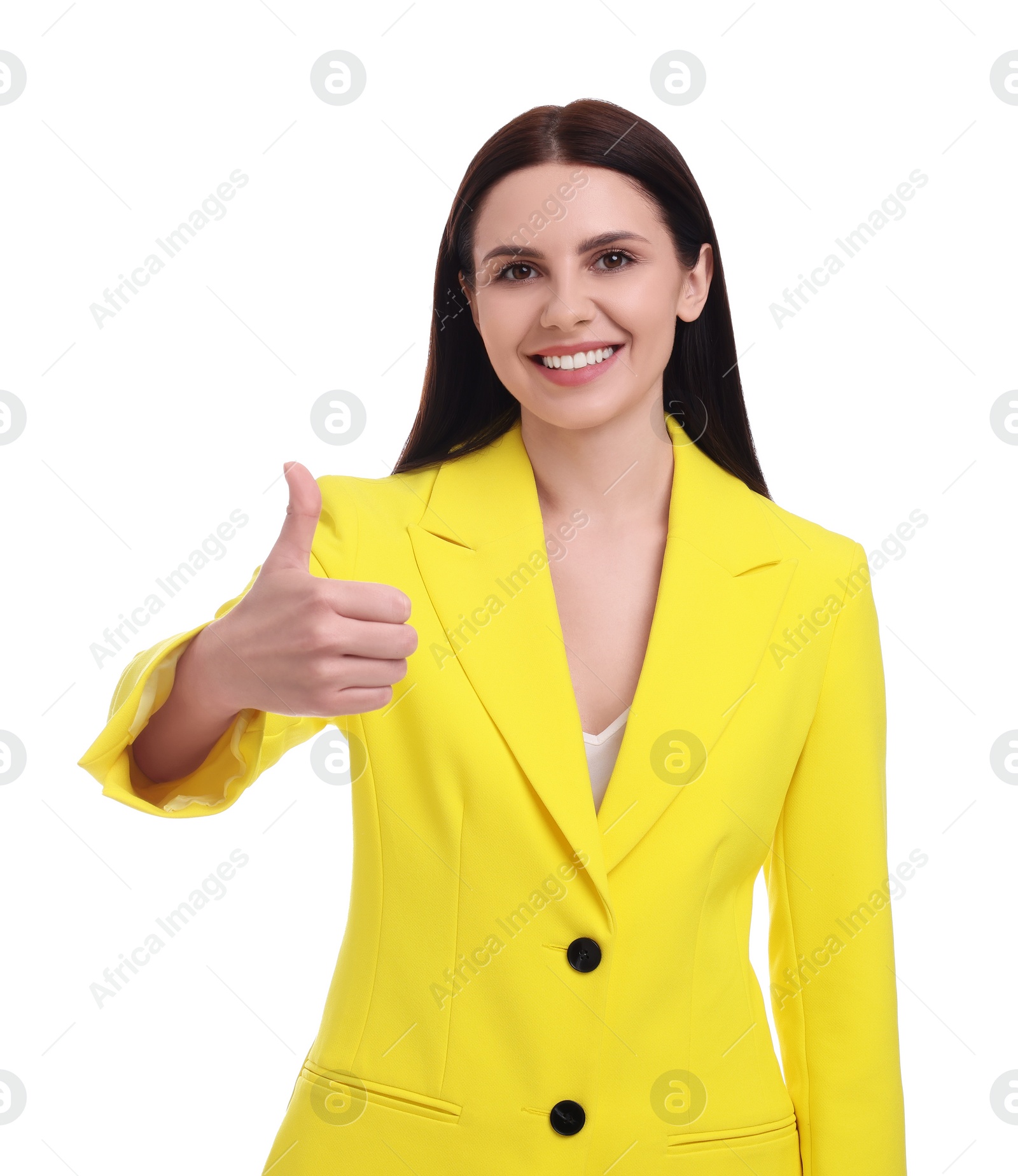 Photo of Beautiful happy businesswoman in yellow suit showing thumbs up on white background