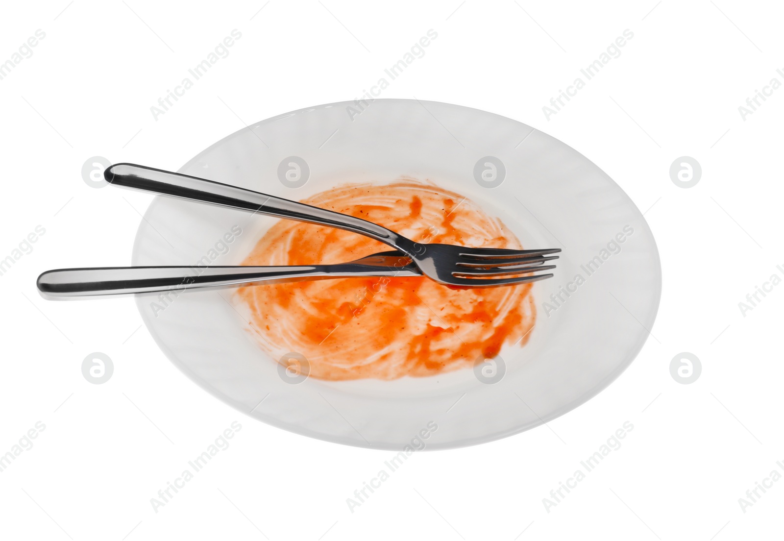 Photo of Dirty plate and cutlery on white background