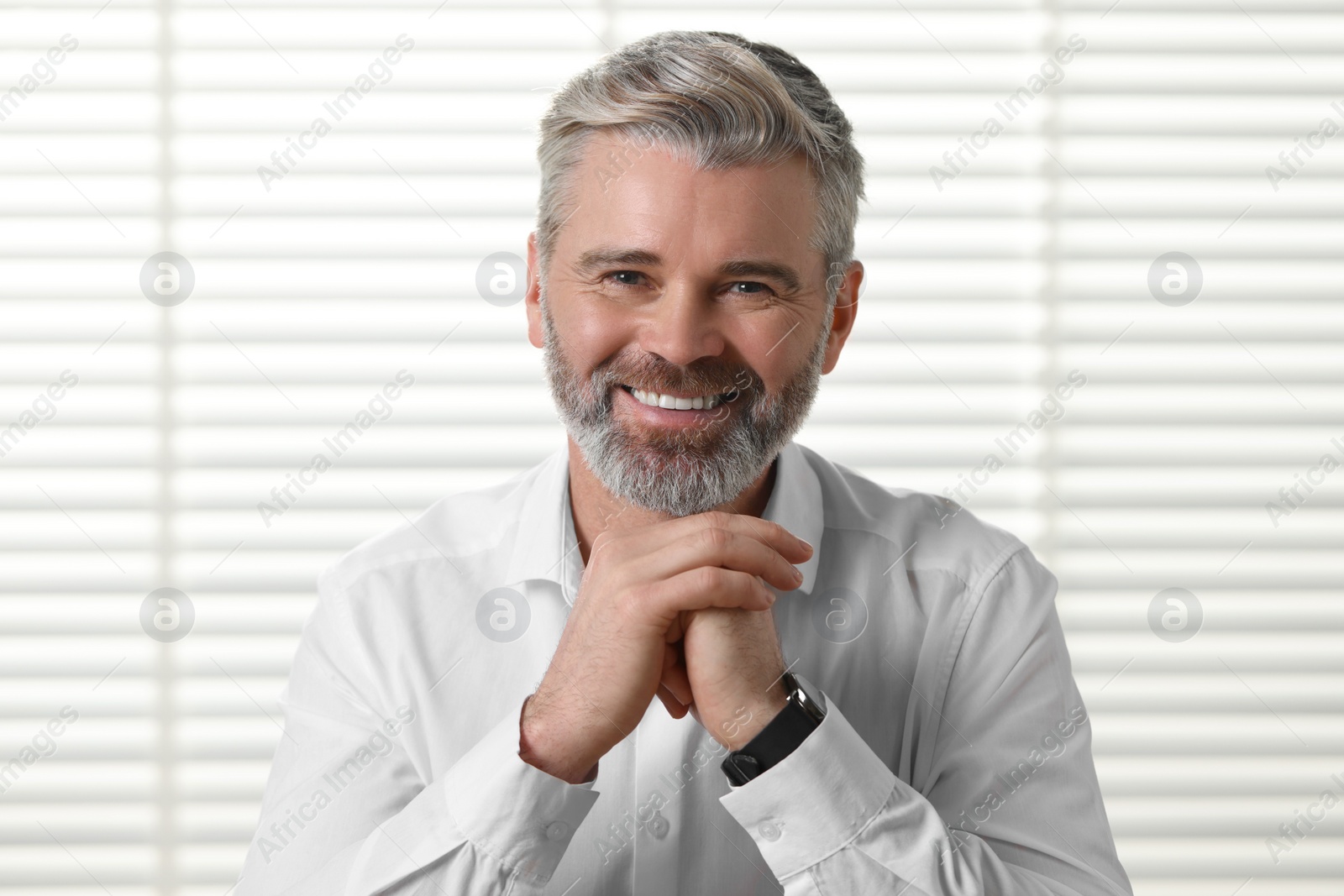 Photo of Happy man having video call at home, view from web camera