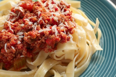 Plate with delicious pasta bolognese, closeup