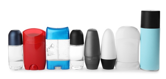 Set of different male deodorants on white background