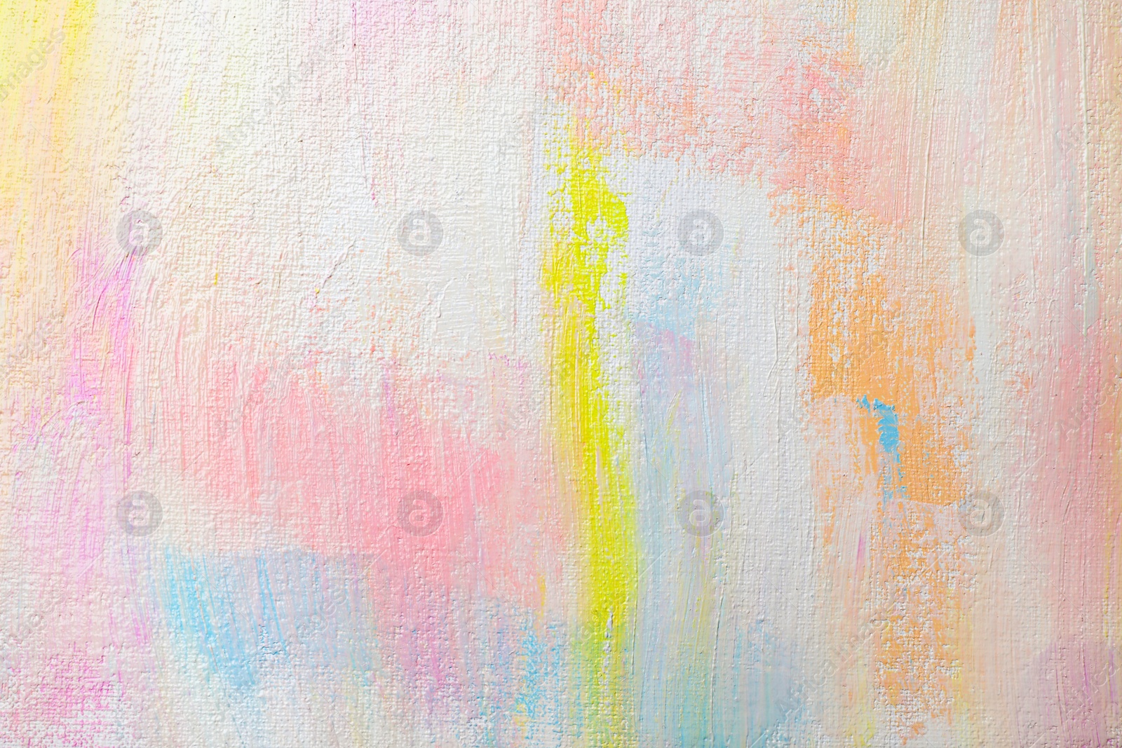 Photo of Strokes of different pastel acrylic paints on white canvas, closeup