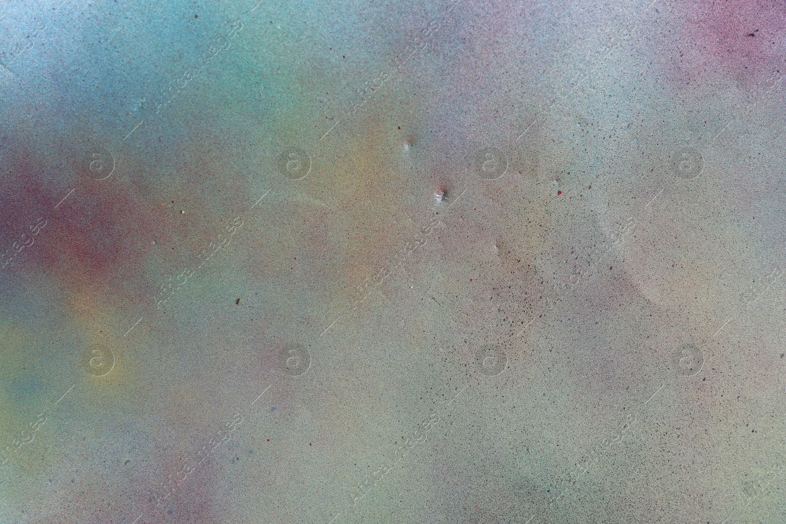 Photo of Texture of abstract spray paint as background, top view