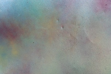 Photo of Texture of abstract spray paint as background, top view