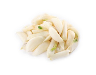 Photo of Peeled cloves of fresh garlic isolated on white