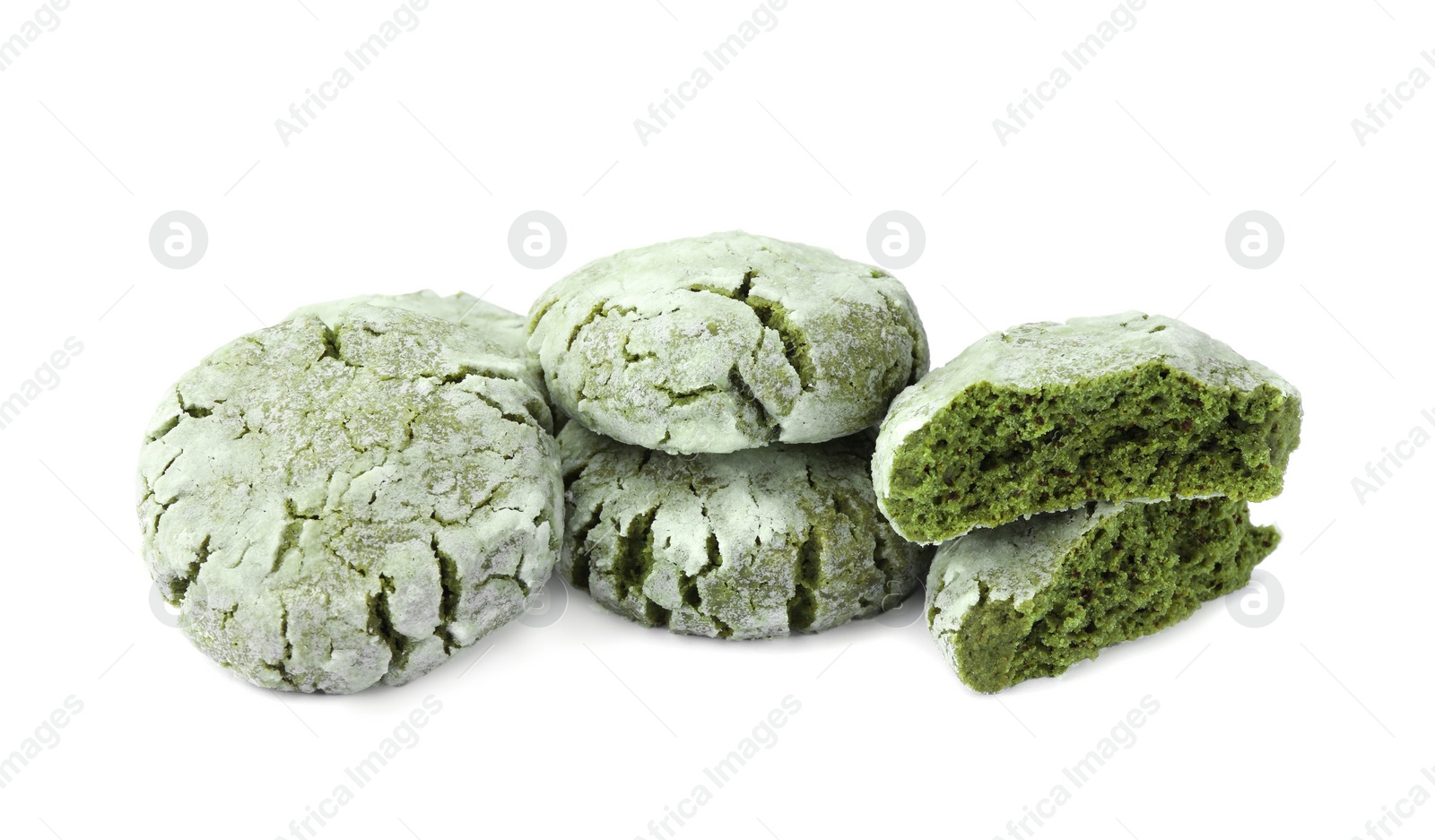 Photo of Tasty whole and broken matcha cookies on white background