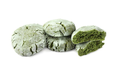 Photo of Tasty whole and broken matcha cookies on white background