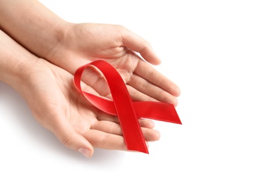 Photo of Woman holding red ribbon on white background. Cancer awareness