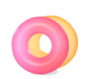 Bright inflatable rings on white background. Summer holidays