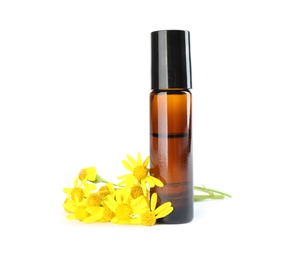 Photo of Bottle of herbal essential oil and flowers isolated on white