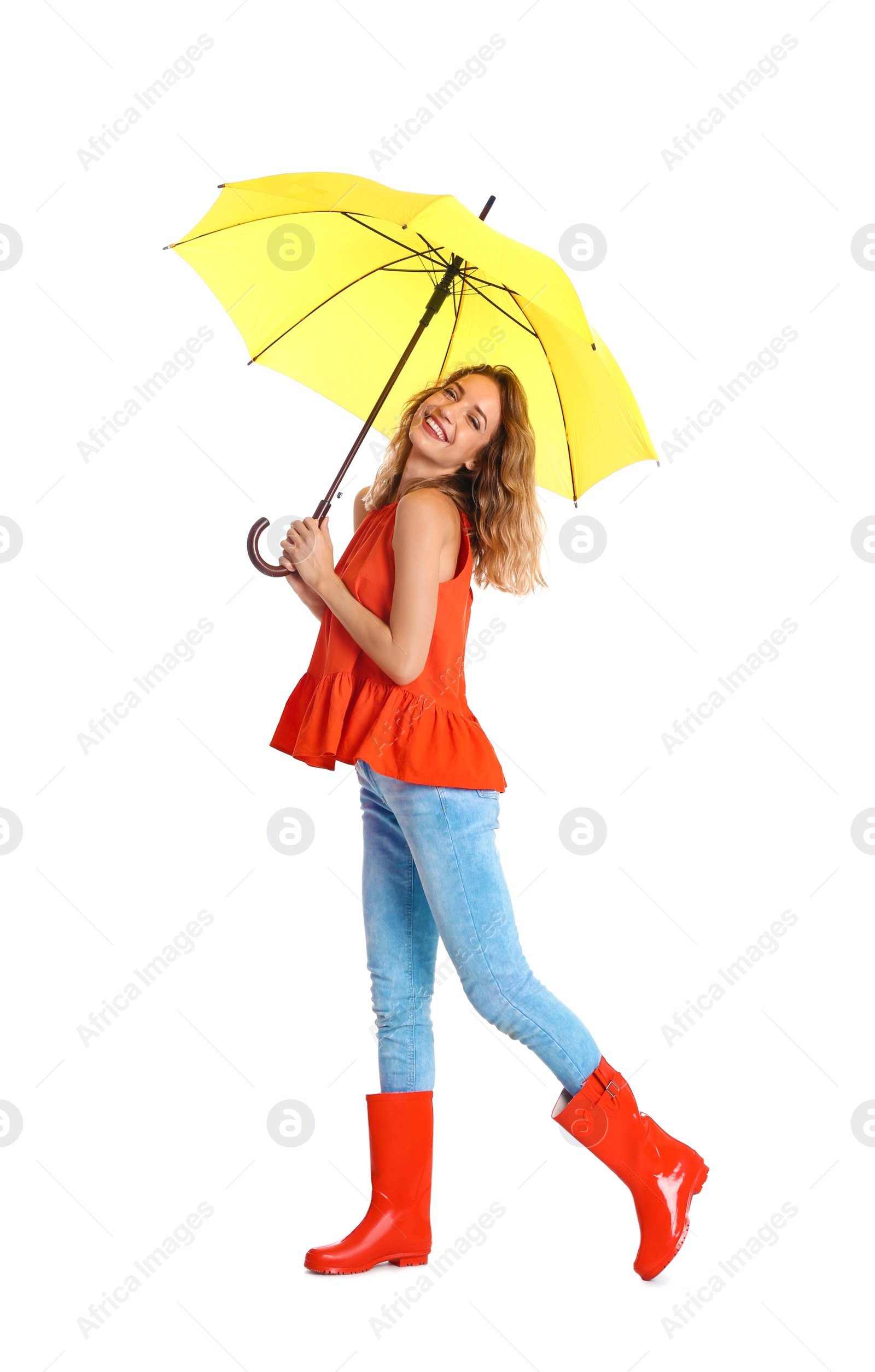 Photo of Woman with yellow umbrella on white background