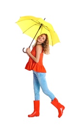 Woman with yellow umbrella on white background