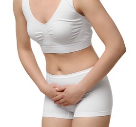 Photo of Woman suffering from cystitis on white background, closeup