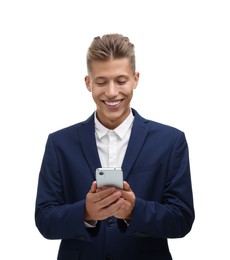 Happy young man sending message via smartphone on white background