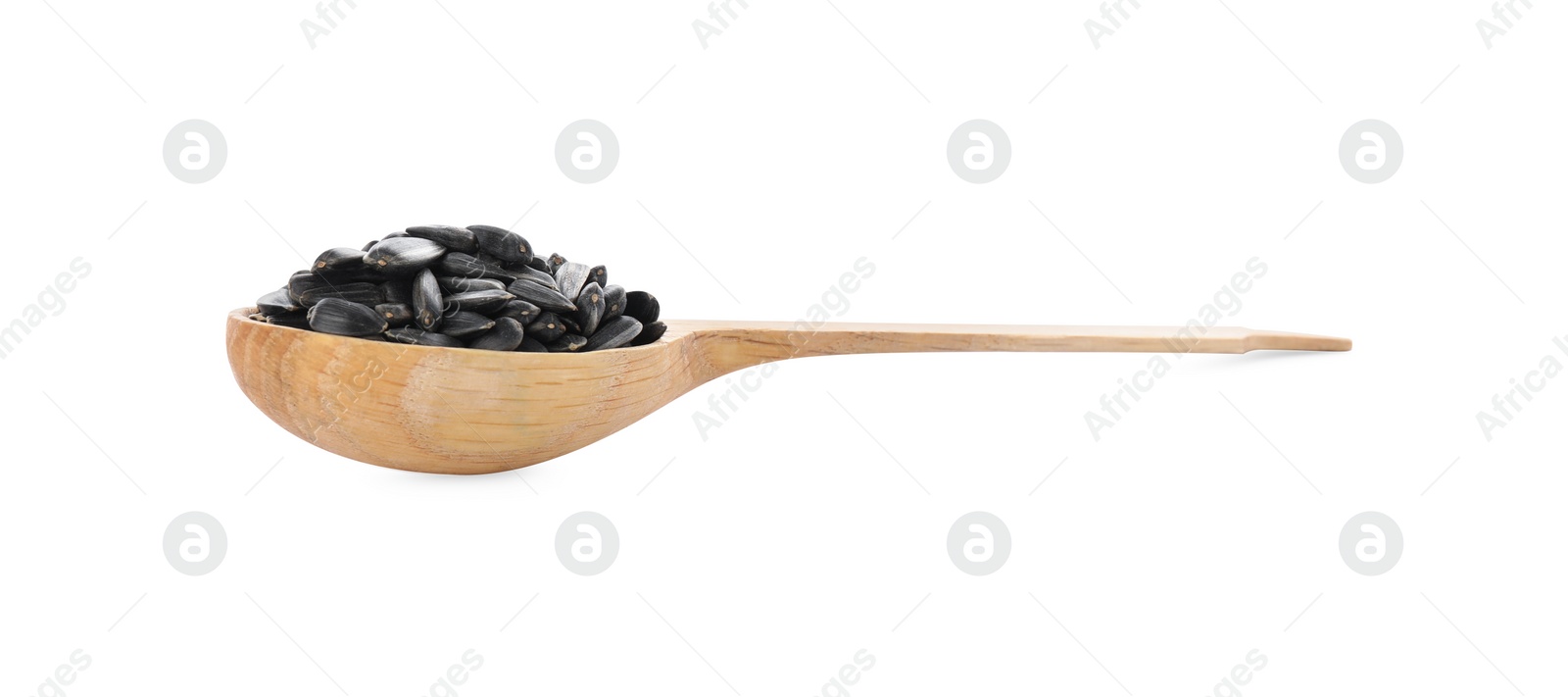 Photo of Sunflower seeds in wooden spoon isolated on white