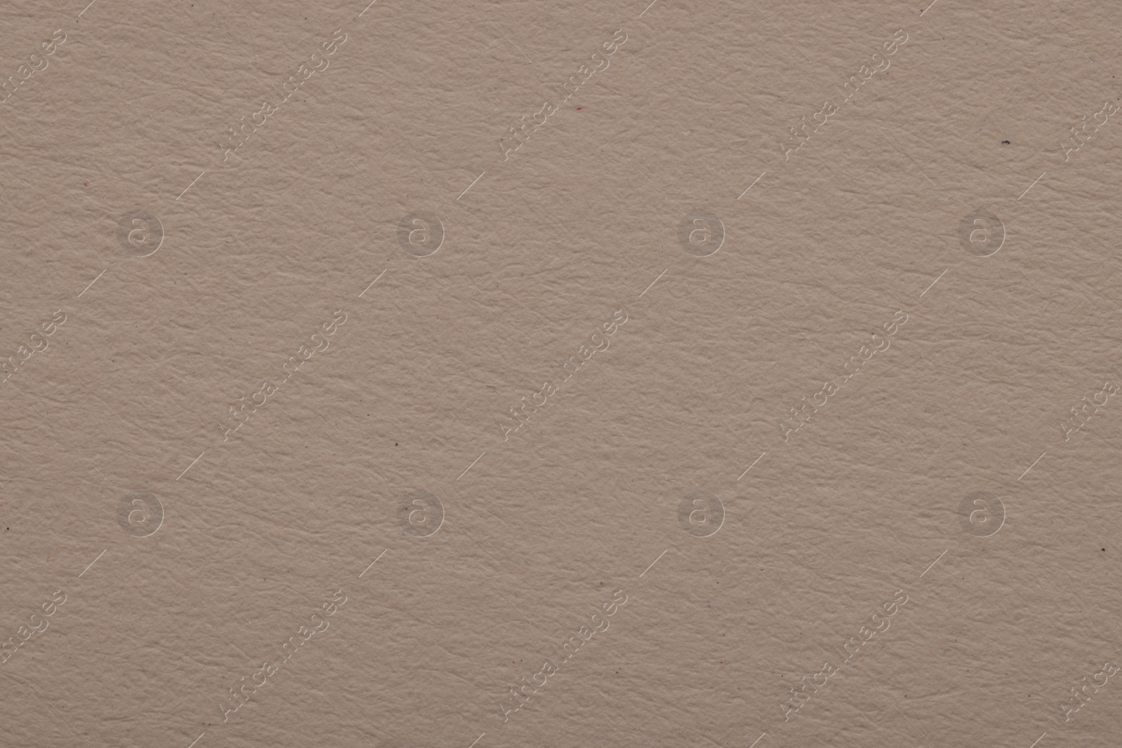 Photo of Texture of light grey paper sheet as background, top view