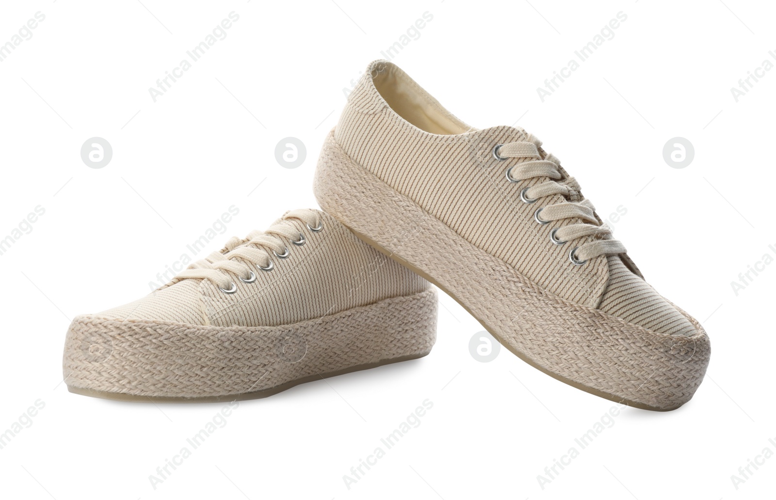 Photo of Pair of stylish sneakers on white background