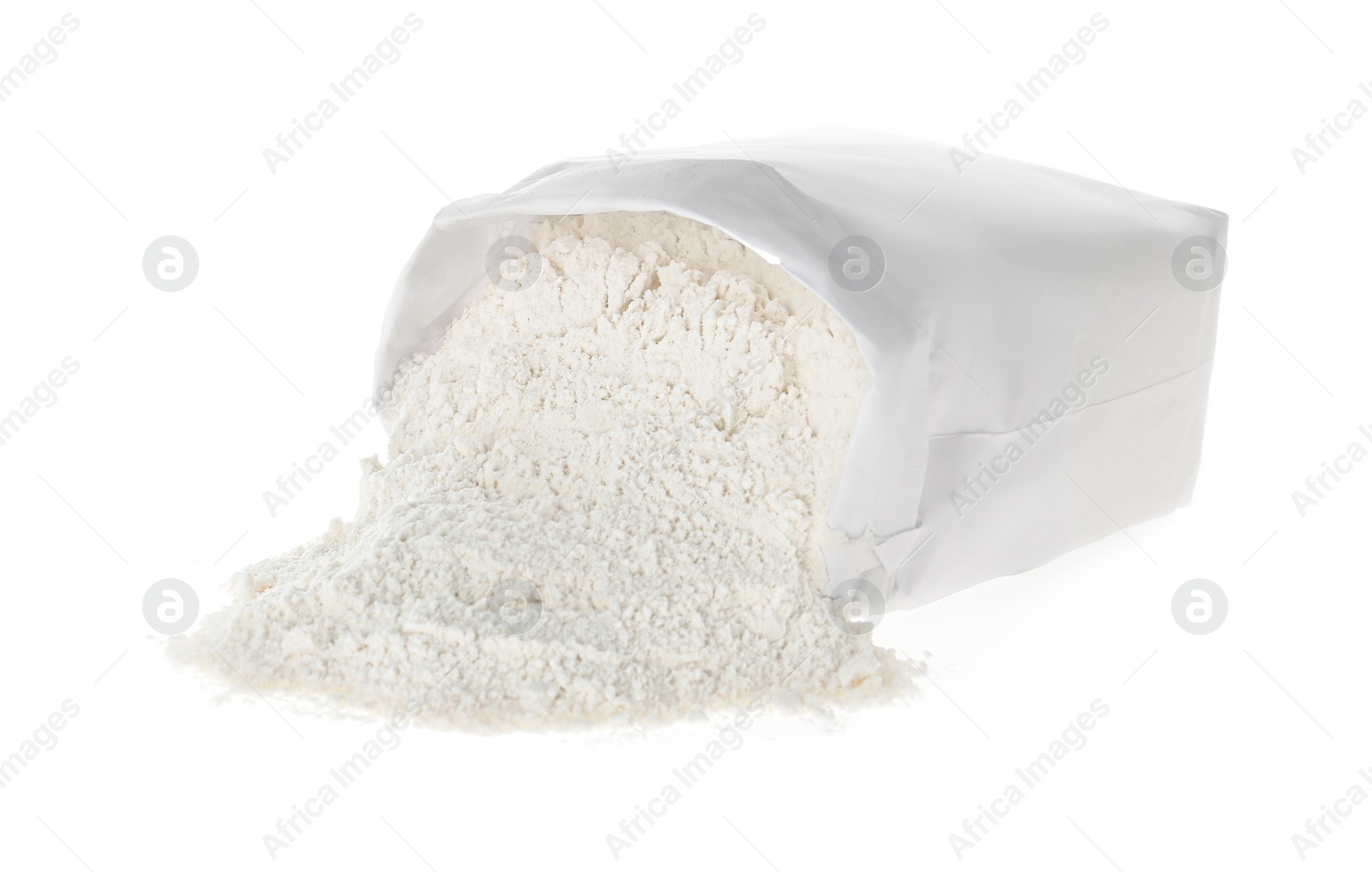 Photo of Overturned paper bag with flour isolated on white