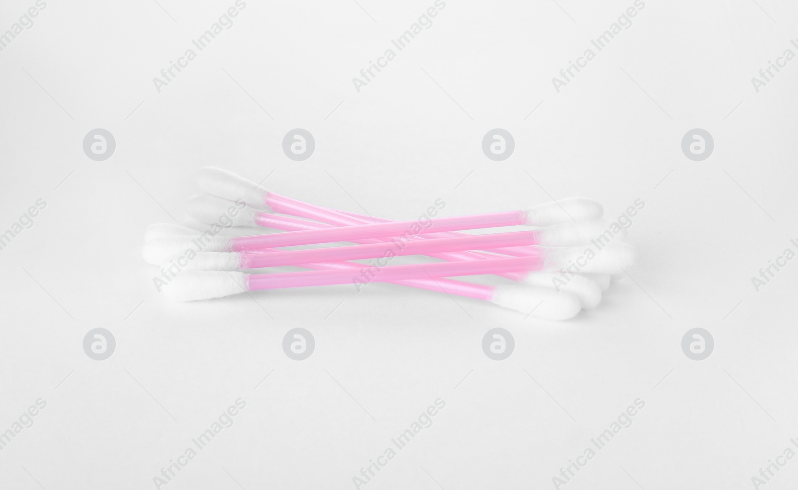 Photo of Clean cotton buds isolated on white. Hygienic product