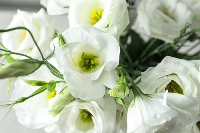 Photo of Beautiful bouquet of Eustoma flowers, close up view