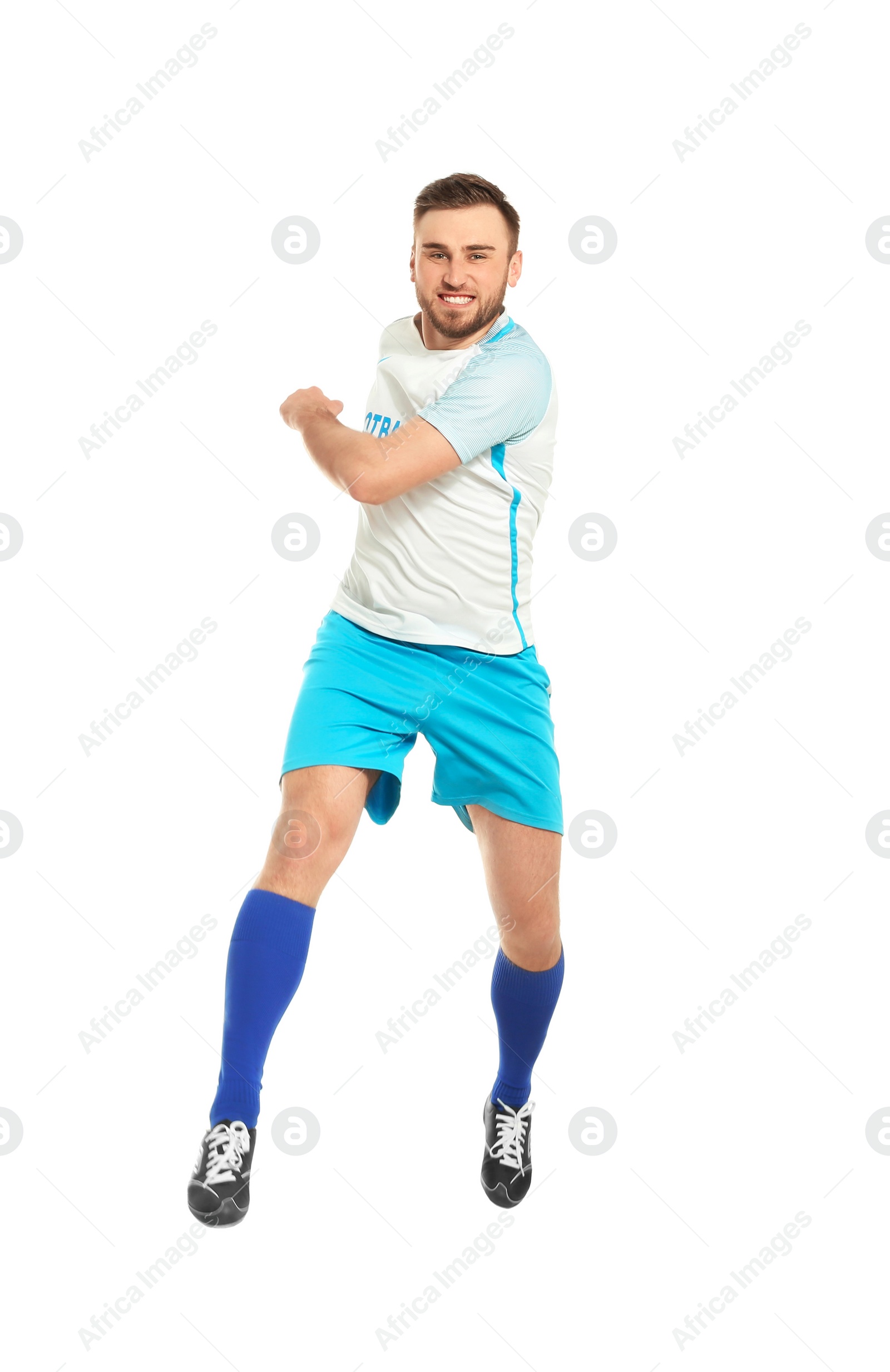 Photo of Young man playing football on white background