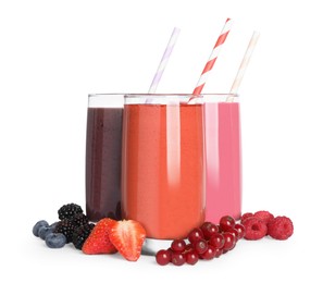 Photo of Glasses with delicious smoothies and ingredients on white background