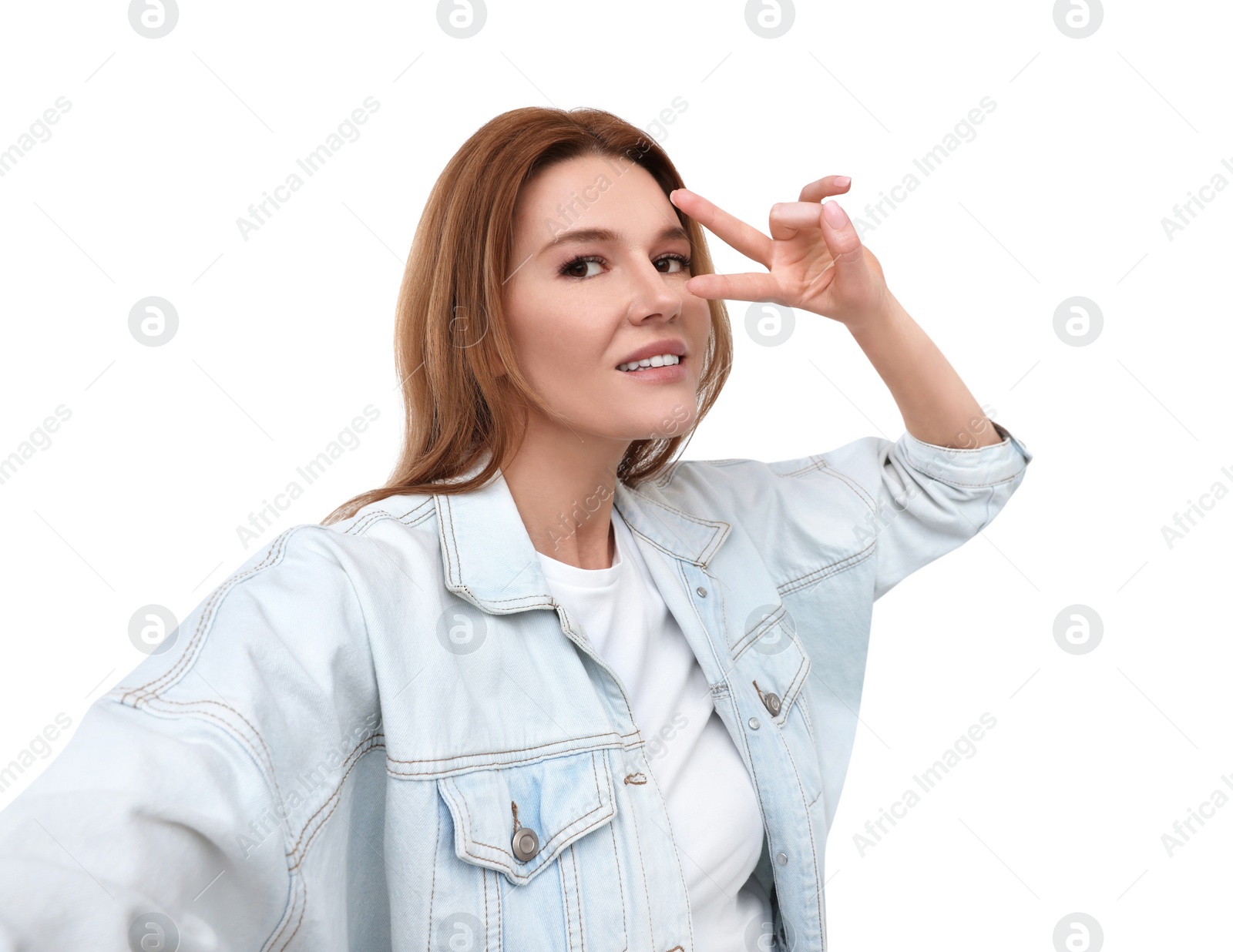 Photo of Beautiful woman taking selfie on white background