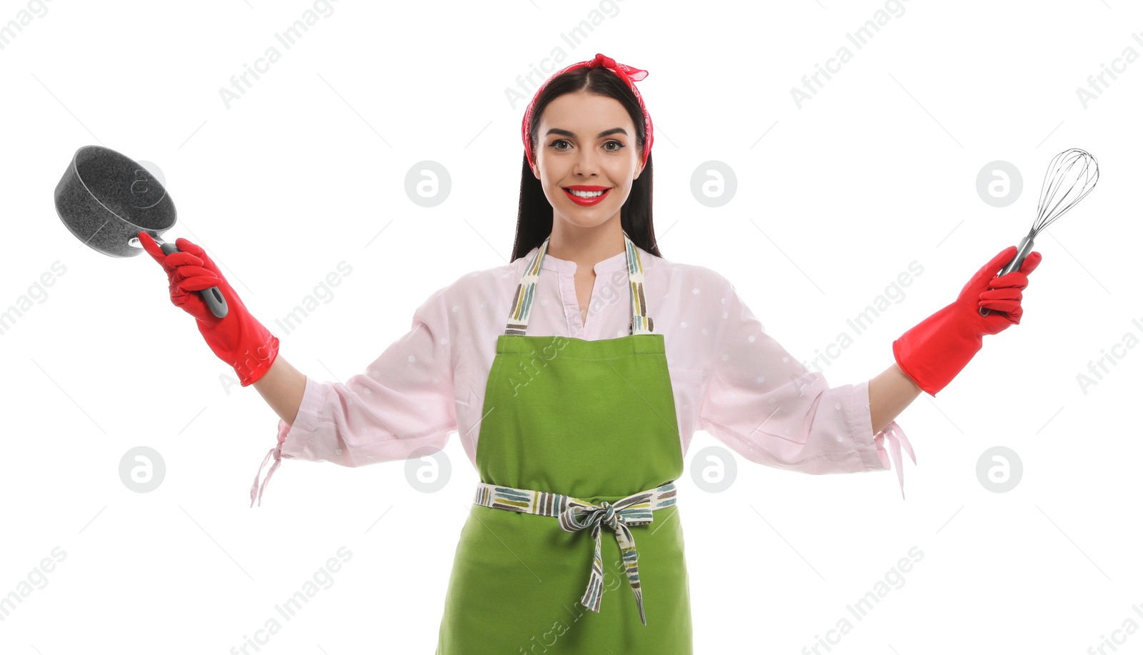 Photo of Young housewife with saucepan and whisk on white background