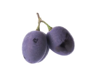 Delicious ripe dark blue grapes isolated on white