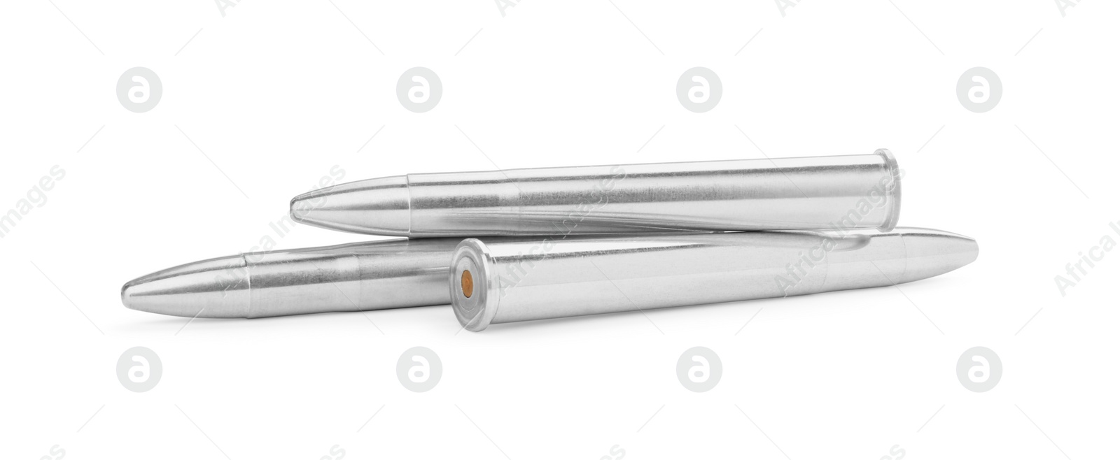 Photo of Metal bullets isolated on white. Military ammunition