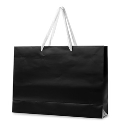 Paper shopping bag with handles on white background. Mockup for design