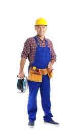 Photo of Electrician with extension cord reel and tools  wearing uniform on white background