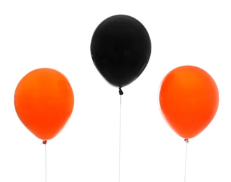 Photo of Colorful balloons on white background. Halloween party