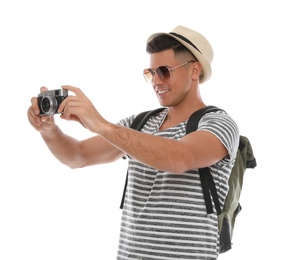 Photo of Man with straw hat taking picture on white background. Summer travel