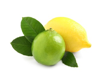 Photo of Fresh ripe lemon, lime and green leaves on white background