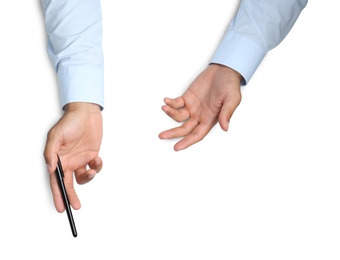 Man with pen on white background, top view. Closeup of hands