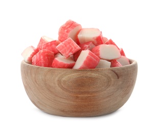 Cut crab sticks in wooden bowl on white background