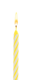 Photo of Yellow birthday cake candle isolated on white