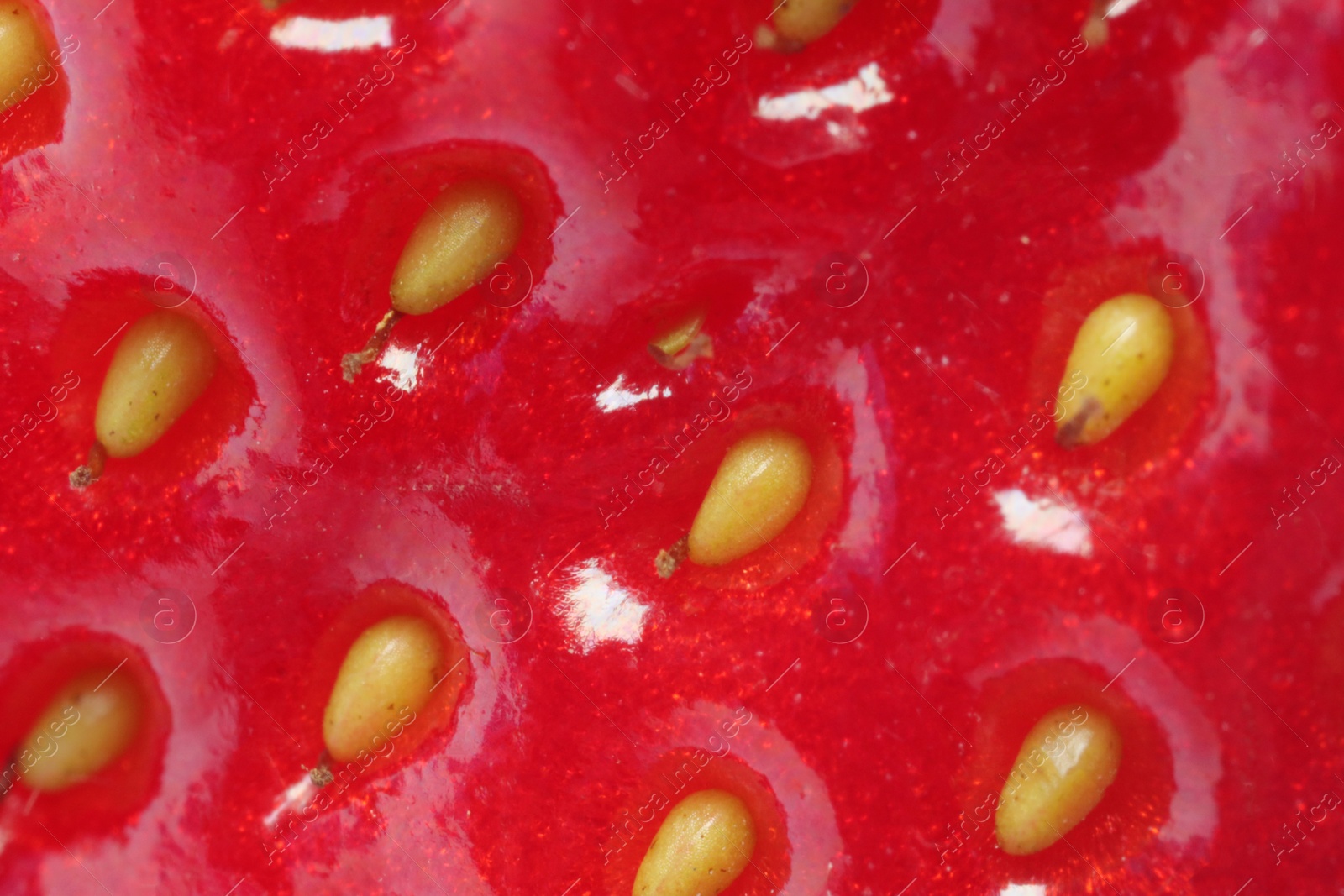 Photo of Texture of ripe strawberry as background, macro view. Fresh berry