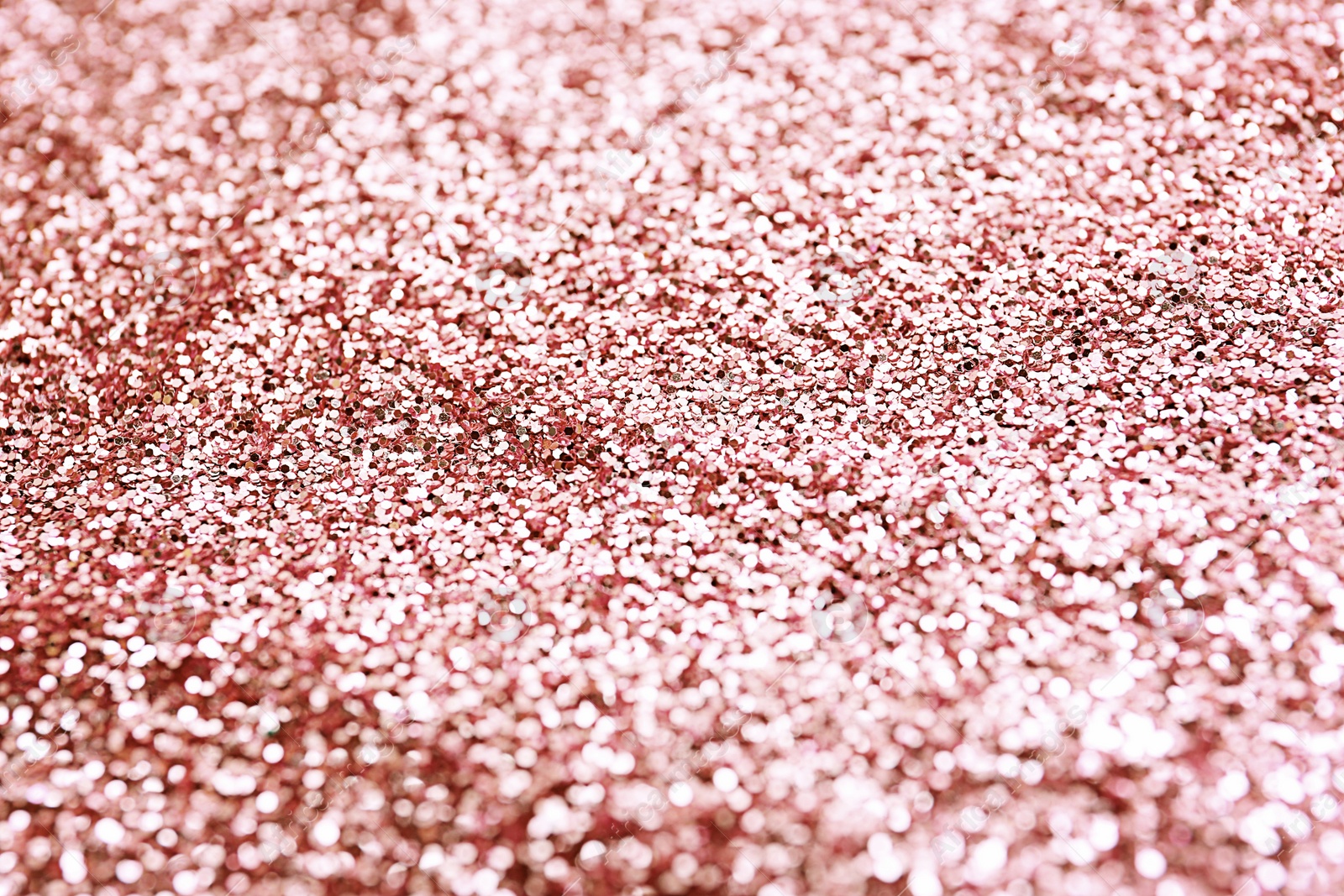 Photo of Texture of rose glitter fabric as background