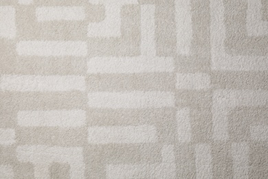 Photo of Fuzzy carpet texture as background, top view