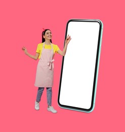 Image of Housewife using big smartphone on pink background