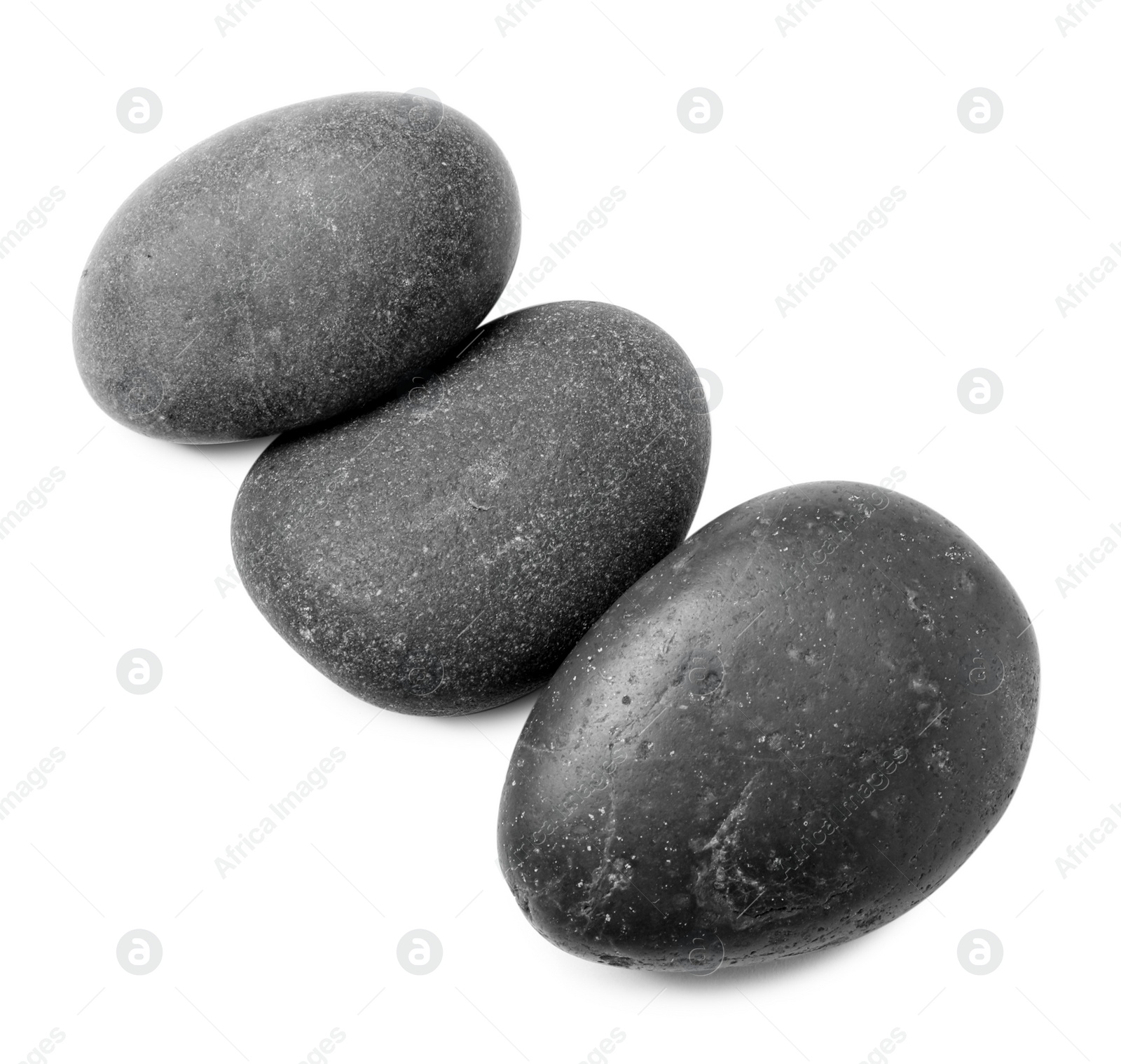 Photo of Group of different stones on white background, top view